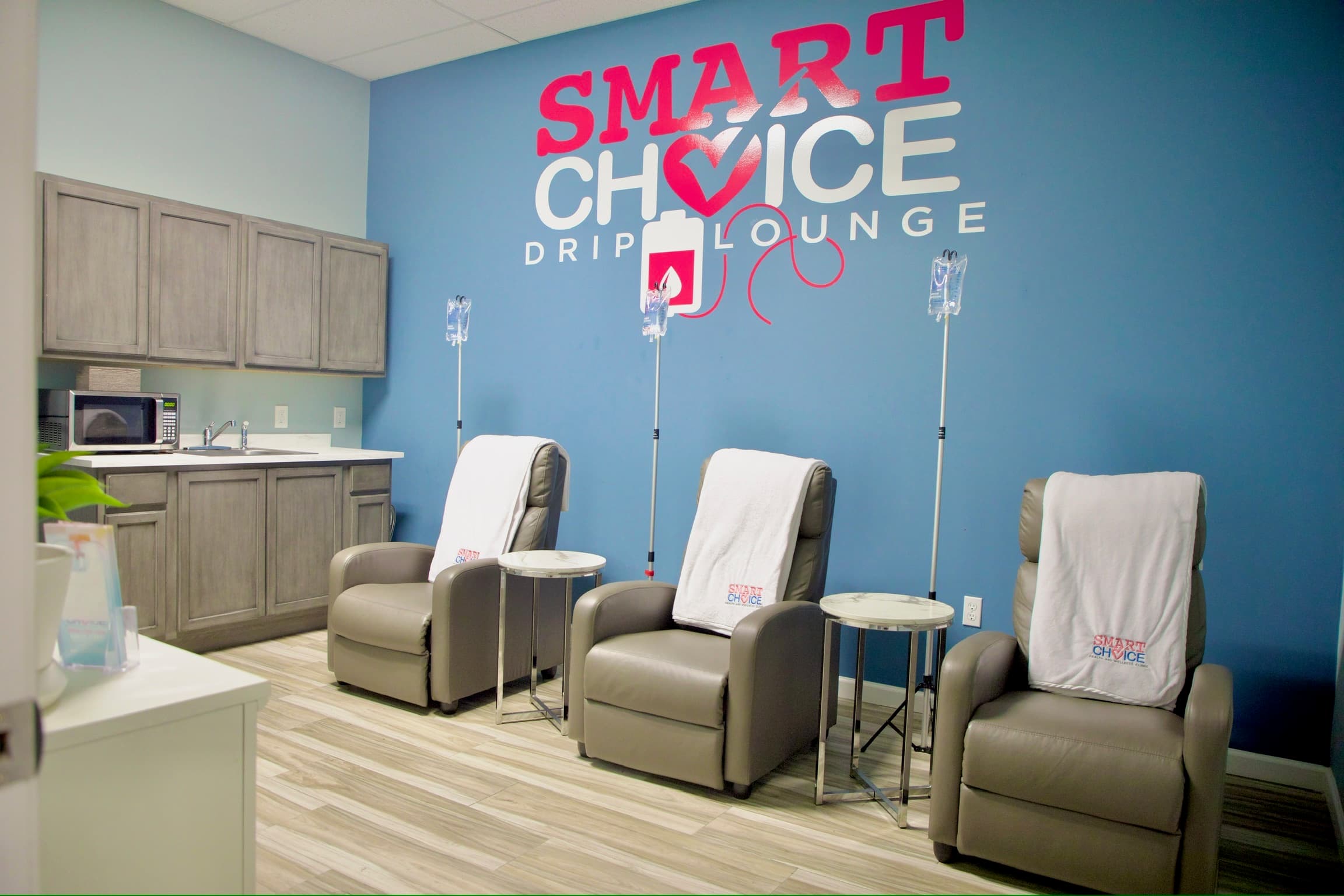 The Smart Choice Drip Lounge with three reclining chairs and IV poles
